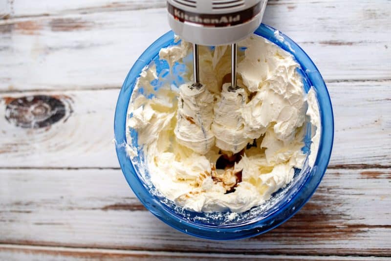 Beat the cream cheese and mix in a teaspoon of vanilla.