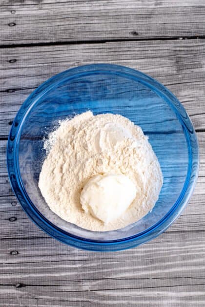 Place flour and shortening in mixing bowl.