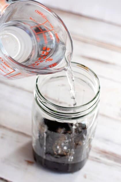 Add water to jar.