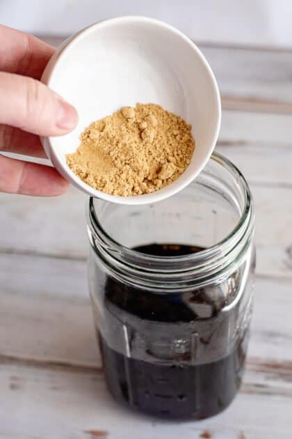 Add ground ginger to jar.