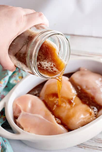 Pour marinade all over chicken breasts.