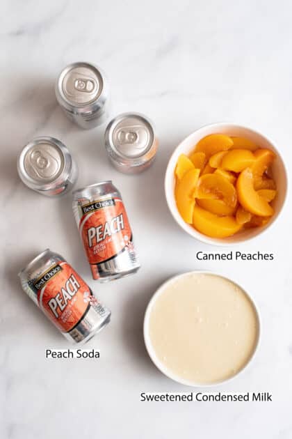 Labeled ingredients for homemade peach ice cream.