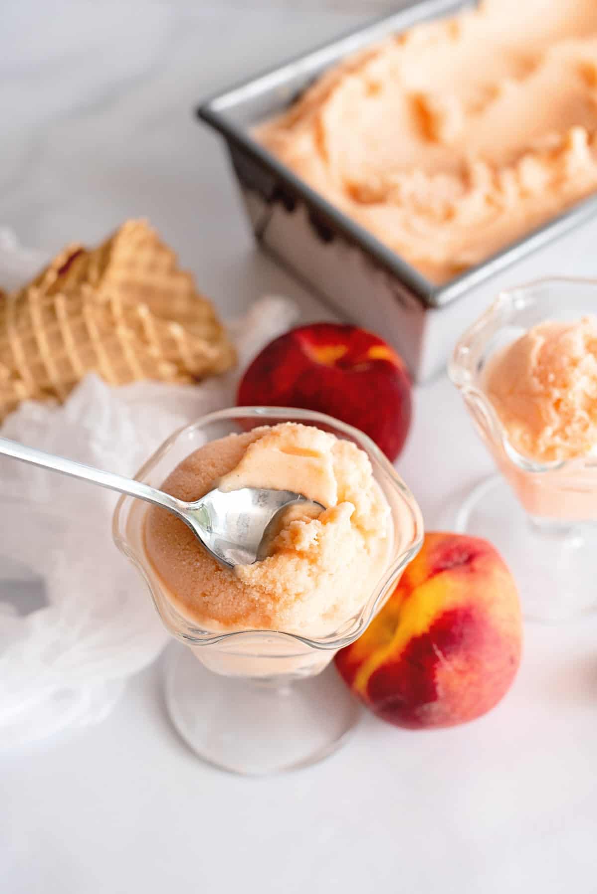 Cup of homemade peach ice cream.