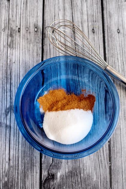 Place cinnamon and sugar in a mixing bowl.