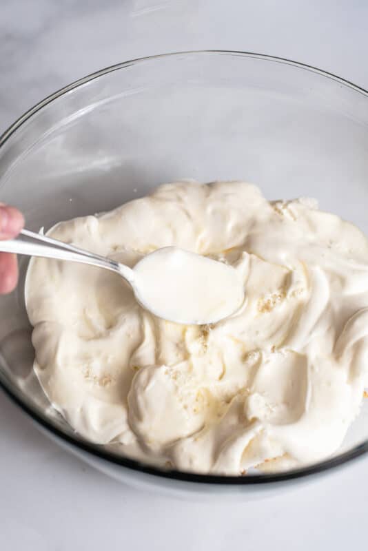 spread pudding mixture over cake cubes.