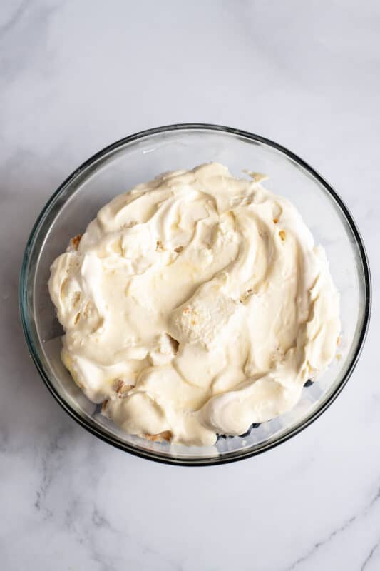 spread whipped topping over the angel food cake cubes.