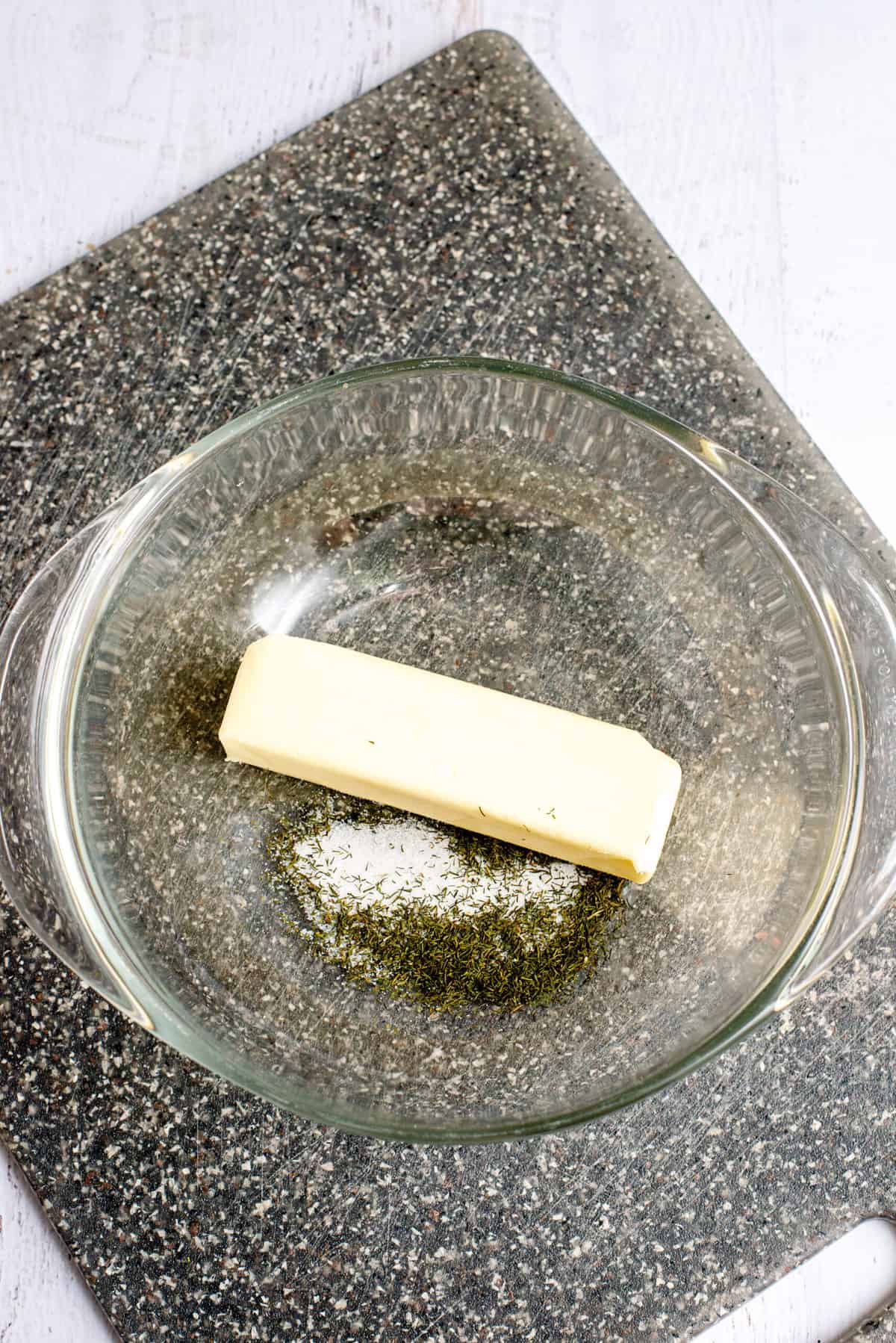 place stick of butter in microwave safe bowl
