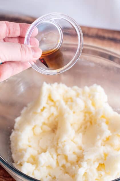 Add vanilla to mixing bowl.