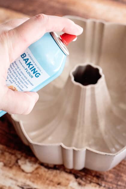 Grease bundt pan with cooking spray.