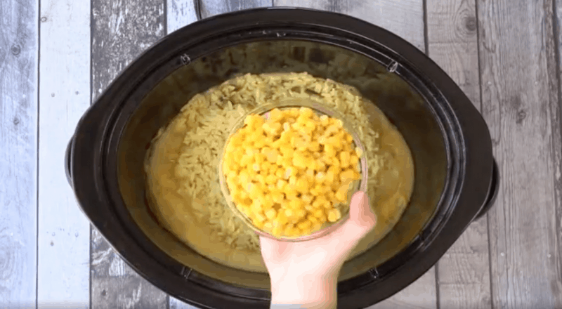 Add corn to the slow cooker.