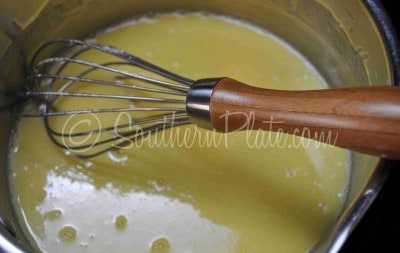 Continue to use whisk to stir pie filling.