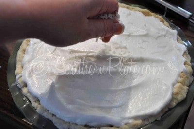 Add coconut to meringue pie topping.