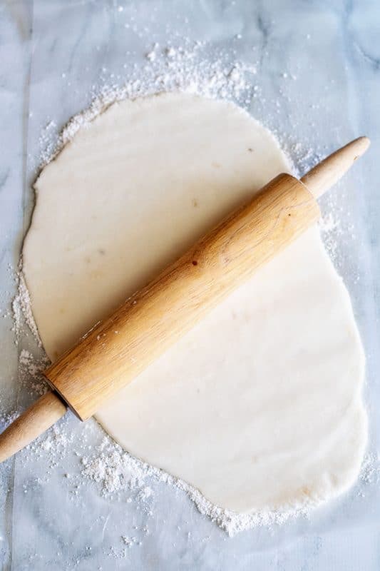 roll out dough for potato candy