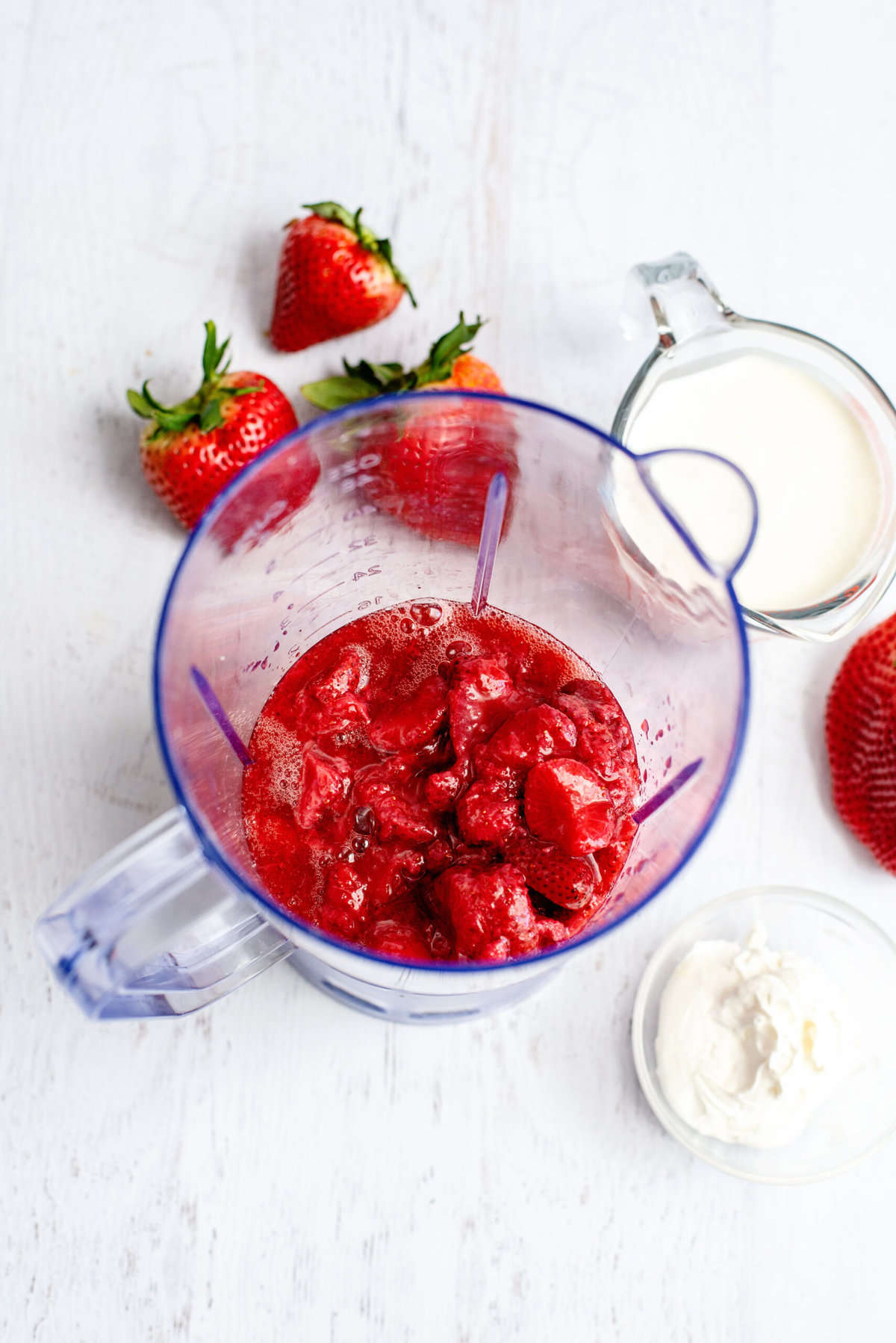 place thawed strawberries in a blender