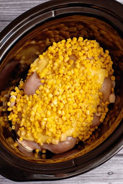 Add corn to slow cooker.