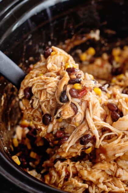 Spoonful of crockpot fiesta chicken and rice.