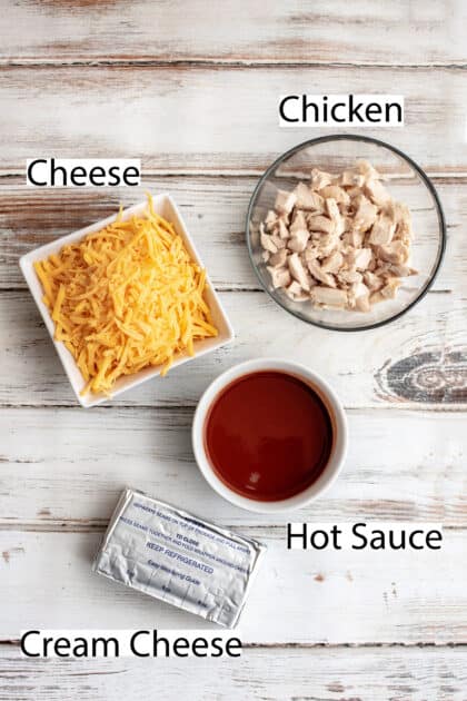 Labeled recipe ingredients for easy baked buffalo chicken dip.