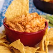 Bowl of buffalo chicken dip with tortilla chips.