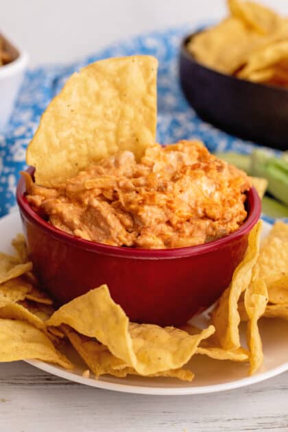 Bowl of buffalo chicken dip with tortilla chips (game day recipes).