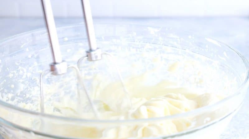 Mixing cream cheese mixture with stand mixer.