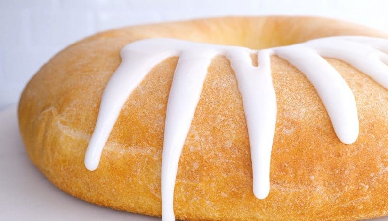 drizzle the icing over the top of the king cake.