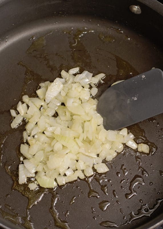 Cook onion in skillet.