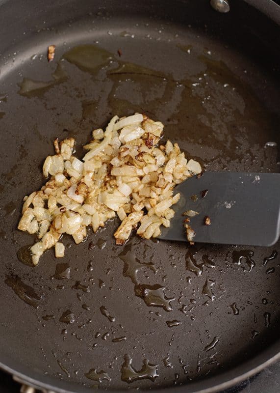 Keep stirring until the onion caramelizes.