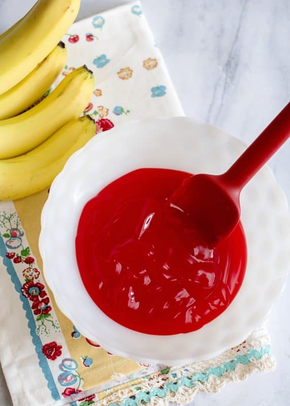 Pour glaze into a mixing bowl.