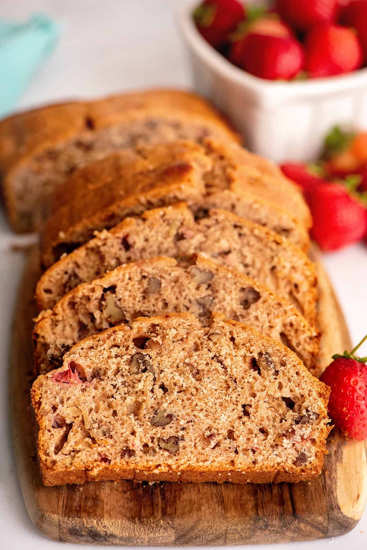 Slices of strawberry bread with pecans.