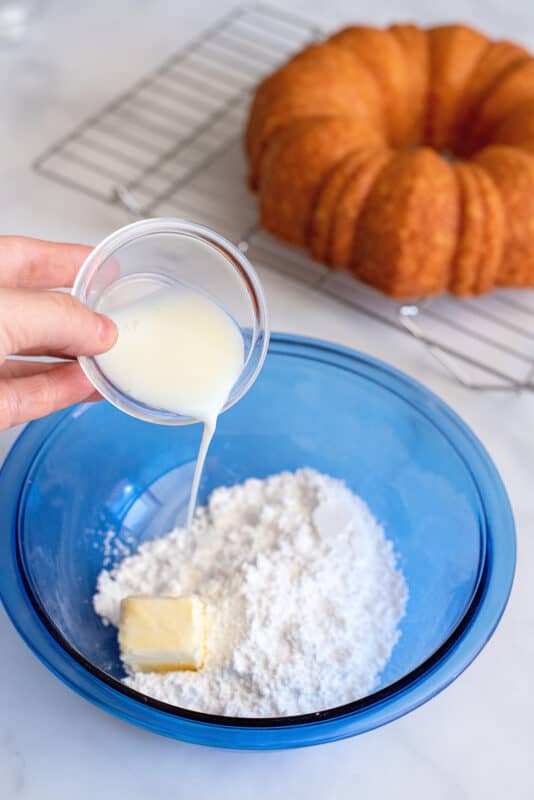 Add milk to glaze ingredients in mixing bowl.