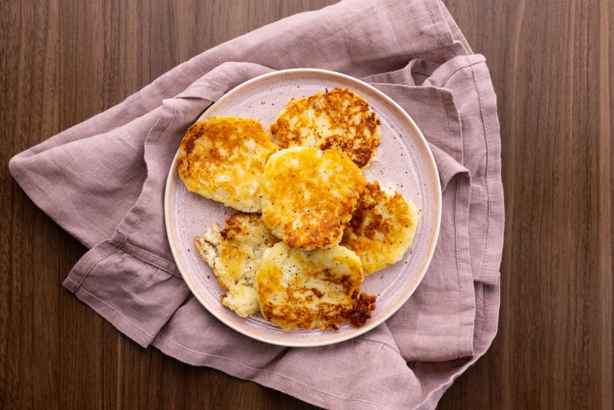 Plate of mashed potato cakes.