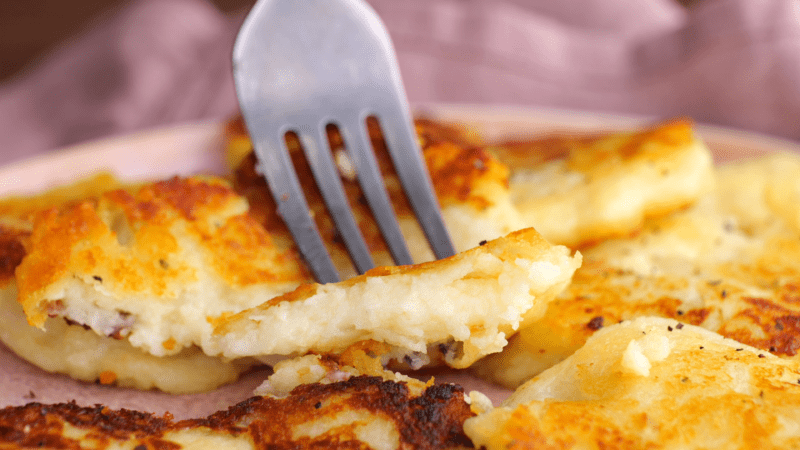 Forkful of potato cake.