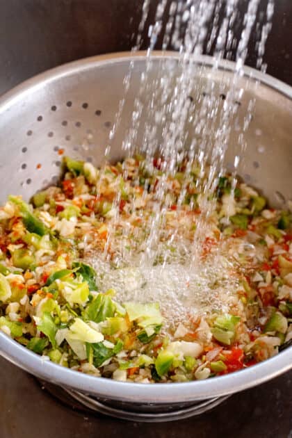 Rinse veggies in colander.