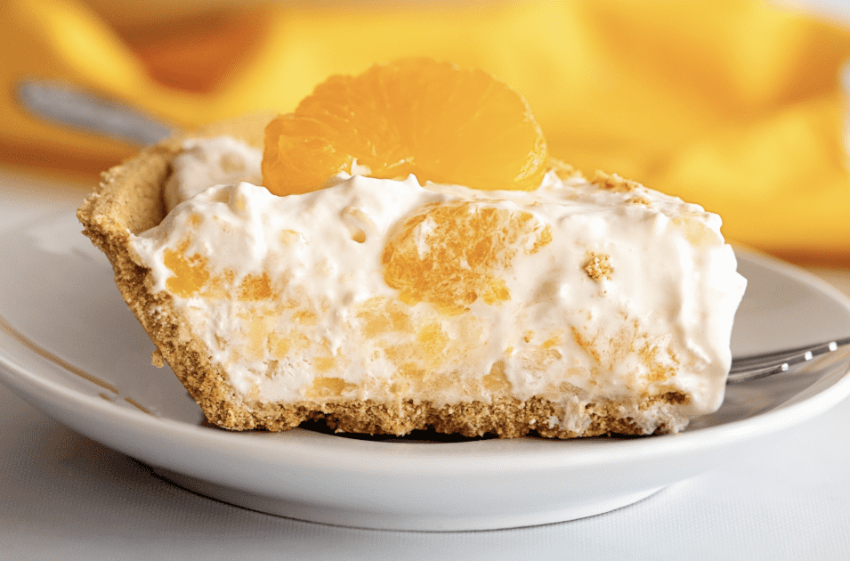 Close-up of slice of mandarin orange pie.