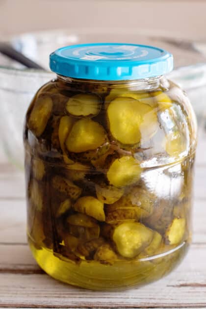 Secure lid and let candied dill pickles sit in fridge for 4 days.