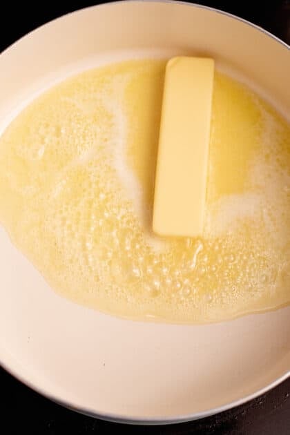 Melt butter in skillet.