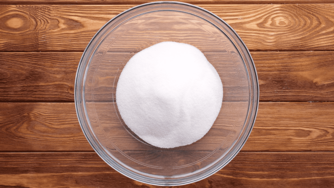 Place sugar in mixing bowl.