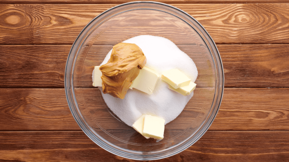 Place peanut butter in mixing bowl.