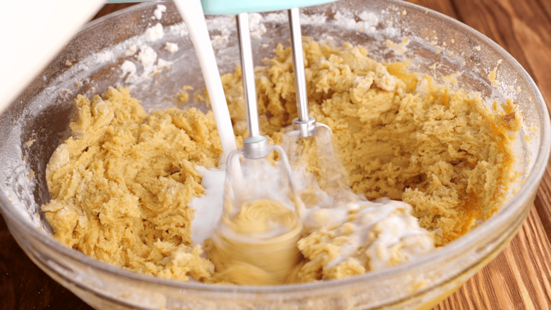 Slowly add buttermilk to peanut butter cake batter as well.