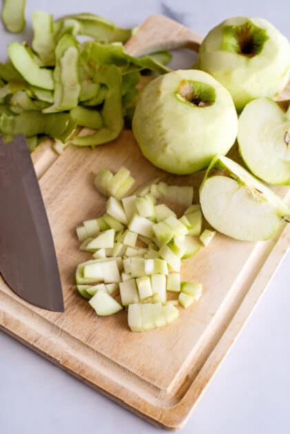Peel and slice apples.