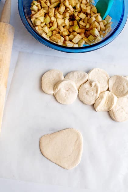 Roll out each piece of biscuit dough.