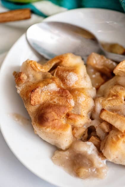 Apple dumplings on a plate.