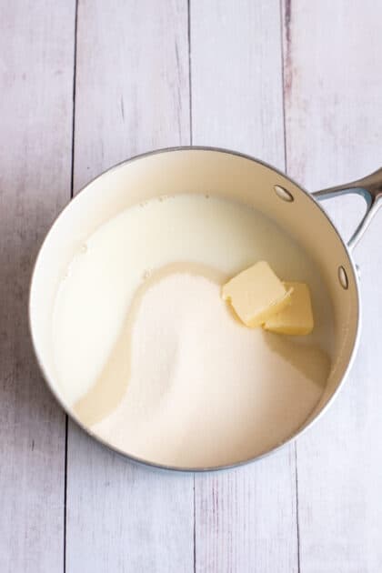 Place sugar, butter, and milk in a heavy-bottomed saucepan. 