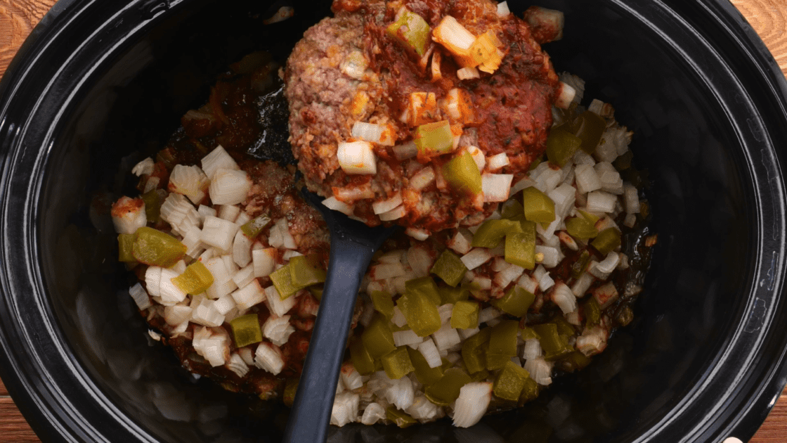 Hamburger patties with gravy in the slow cooker.