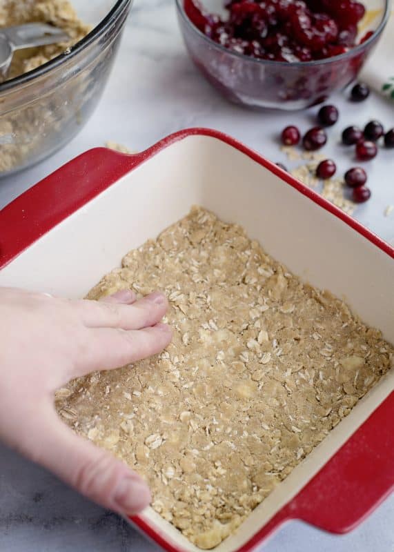 Press half of mixture into the bottom of the baking dish.