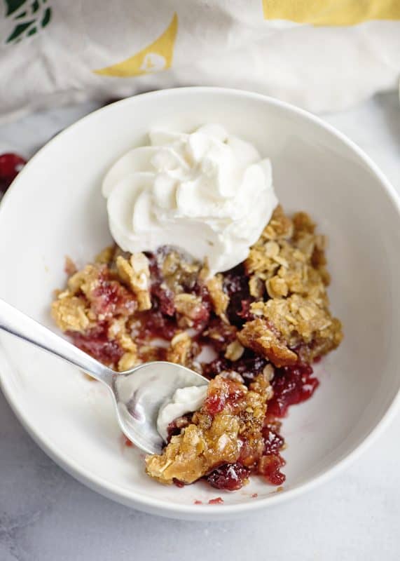 Cranberry crunch with whipped cream.