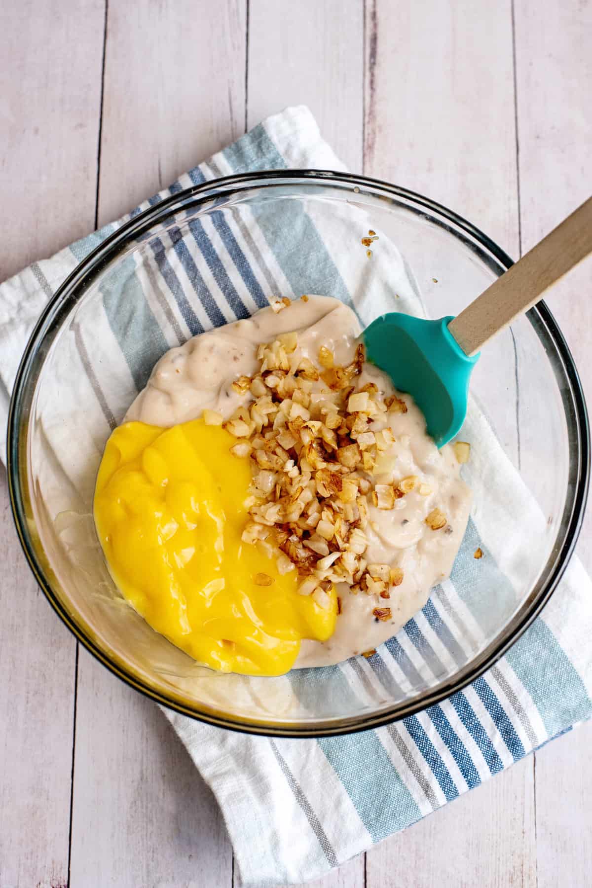 combine soups in a large bowl