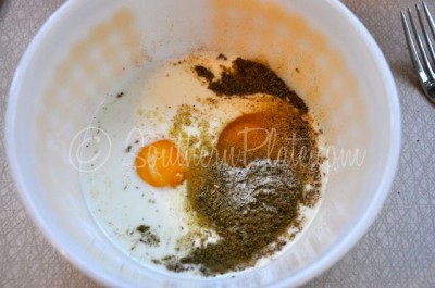 In a small bowl, combine eggs, seasonings, and milk.