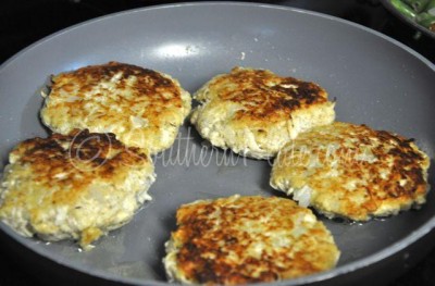 Brown chicken patties in skillet.