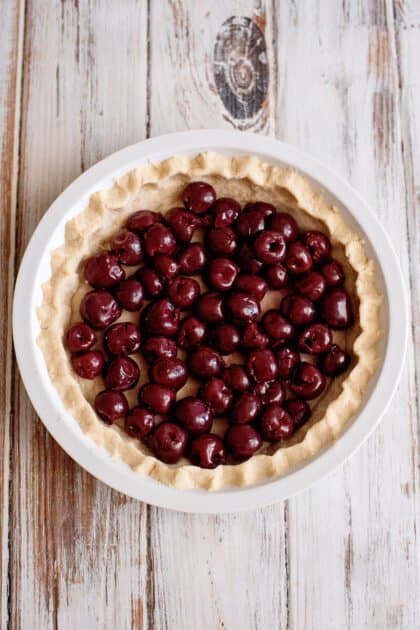 Place cherries in the baked pie crust.